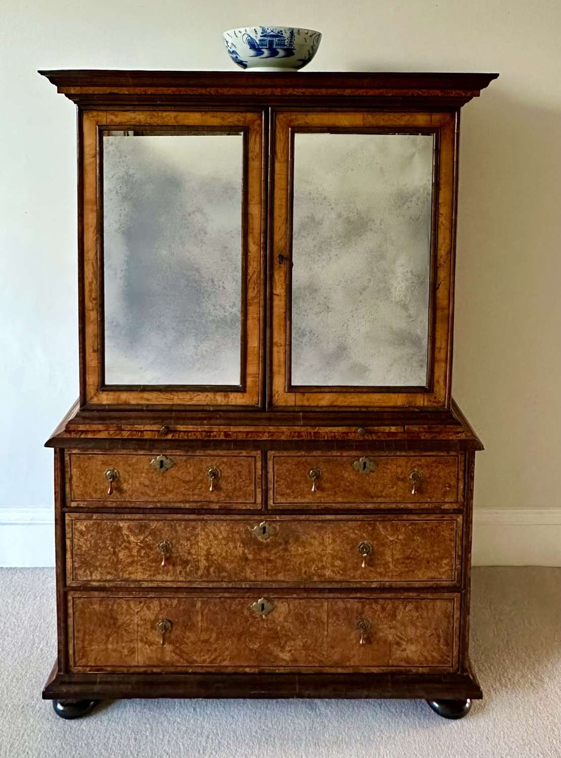 A George I 'Mulberry' Cabinet on Chest