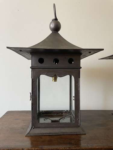 A pair of Arts and Crafts Lanterns